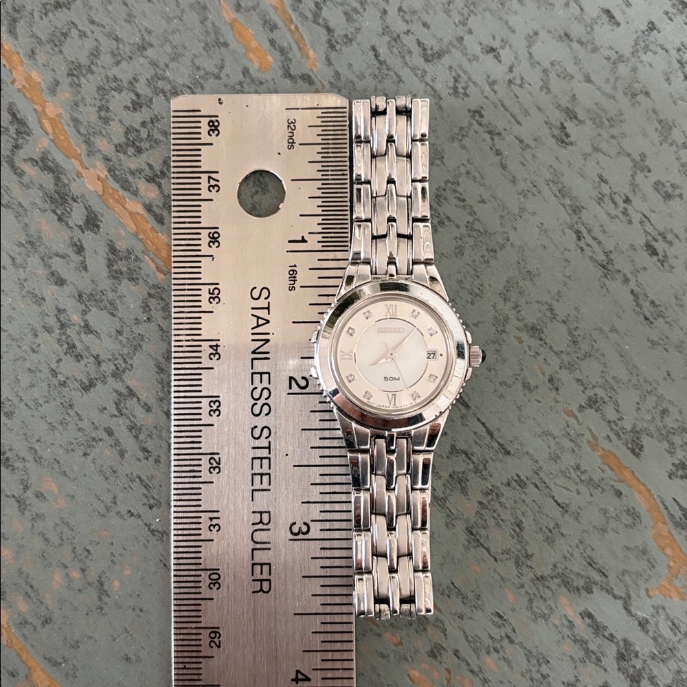 Seiko Stainless Steel Diamond Sapphire Crystal Roman Dial Ladies Watch 7N82-0DH0